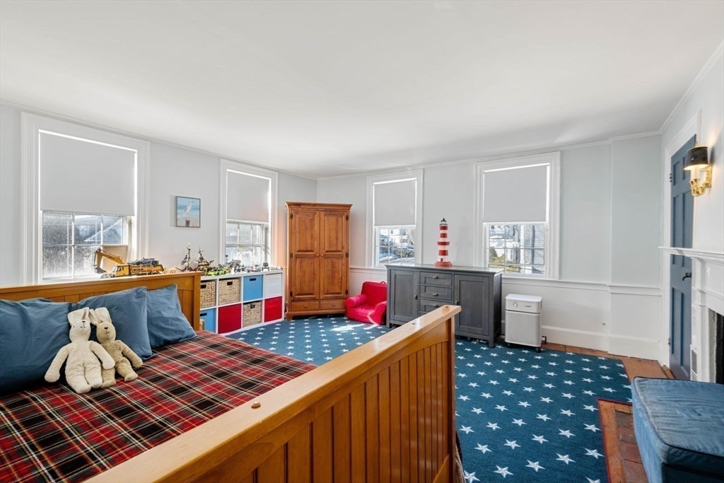 45 School Street Manchester, MA 01944 - Photo 35 of 42 a bedroom with furniture and a window