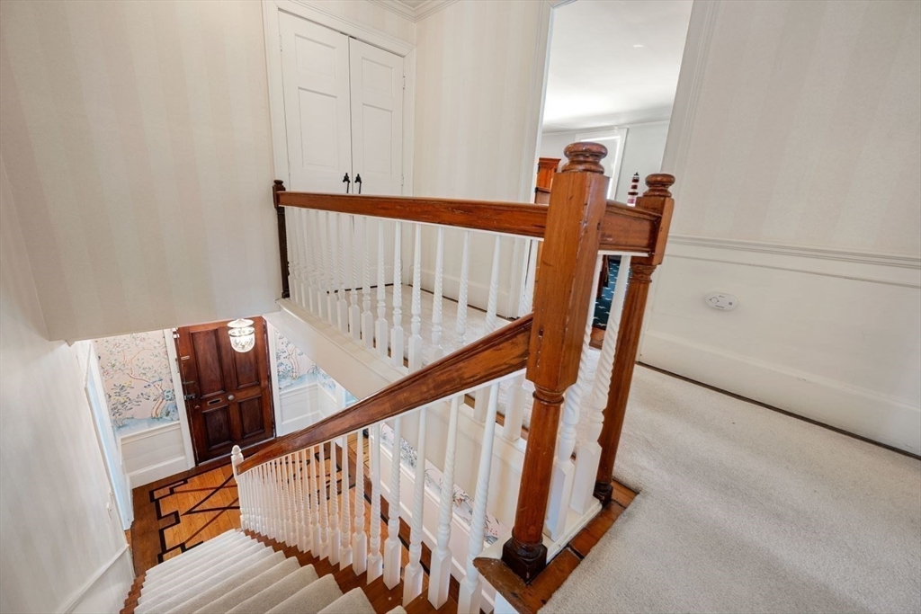 45 School Street Manchester, MA 01944 - Photo 37 of 42 a view of entryway with wooden floor