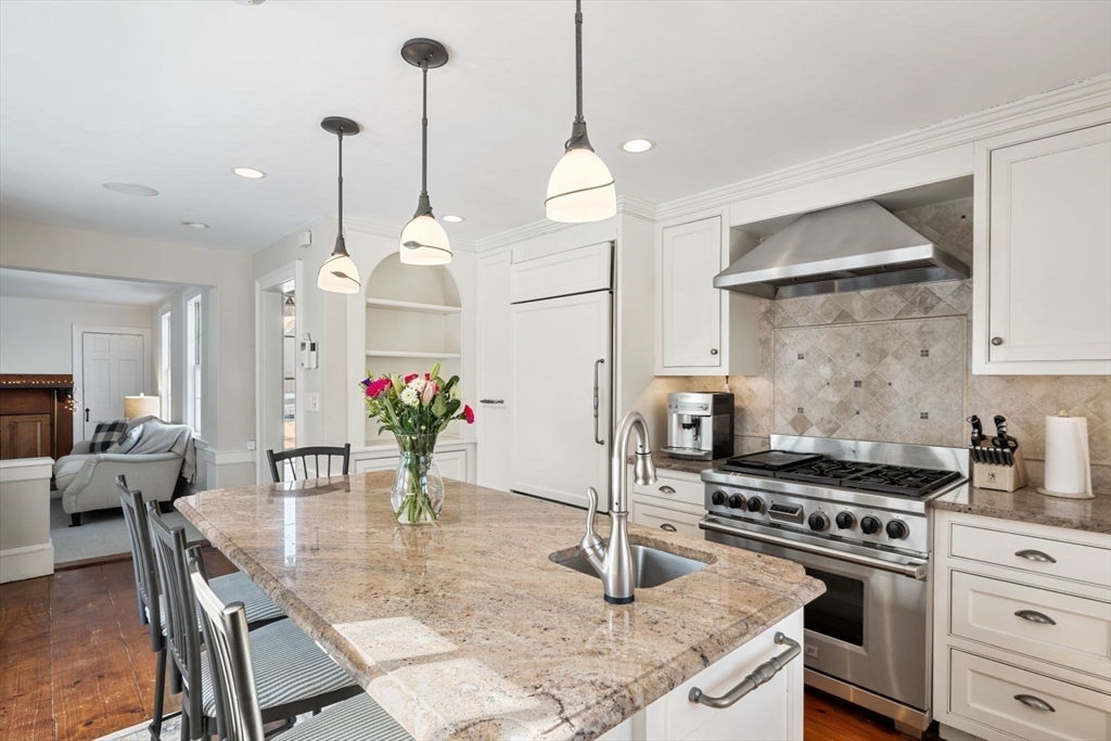 45 School Street Manchester, MA 01944 - Photo 10 of 42 a kitchen with a table and chairs in it