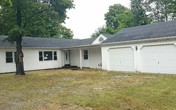 20R Commerce Street Clinton, CT 06413 - Photo 1 of 1 a view of a house with a garage