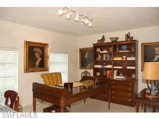 4356 Crayton Road Naples, FL 34103 - Photo 4 of 8 a living room with furniture