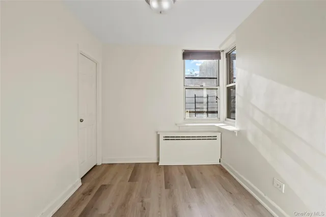a view of kitchen and wooden floor