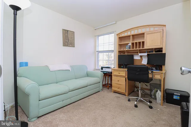 a bedroom with a bed and a cabinets