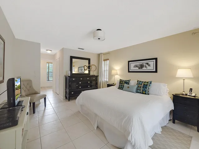 a bedroom with a bed and furniture