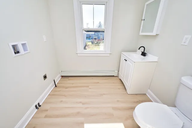 a bathroom with a sink and a toilet