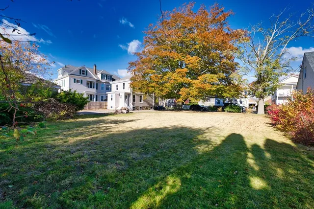 a view of building with yard