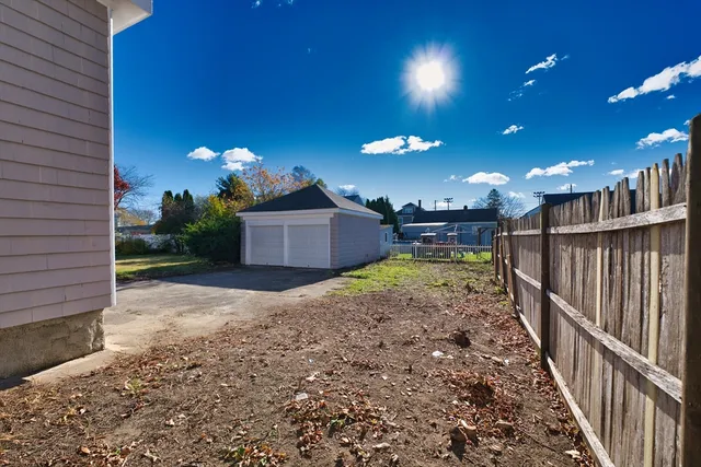 a view of a porch with a table and a chairs