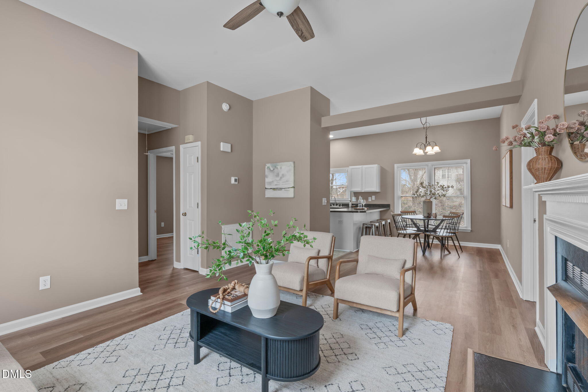 420 Johnson Street Garner, NC 27529 - Photo 10 of 43 a living room with furniture potted plant and a chandelier