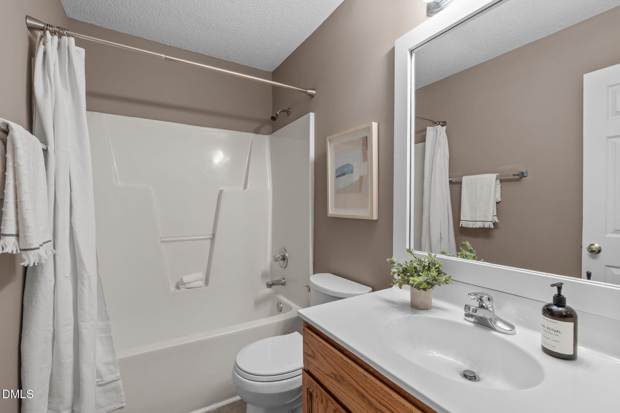 420 Johnson Street Garner, NC 27529 - Photo 30 of 43 a bathroom with a sink toilet and shower