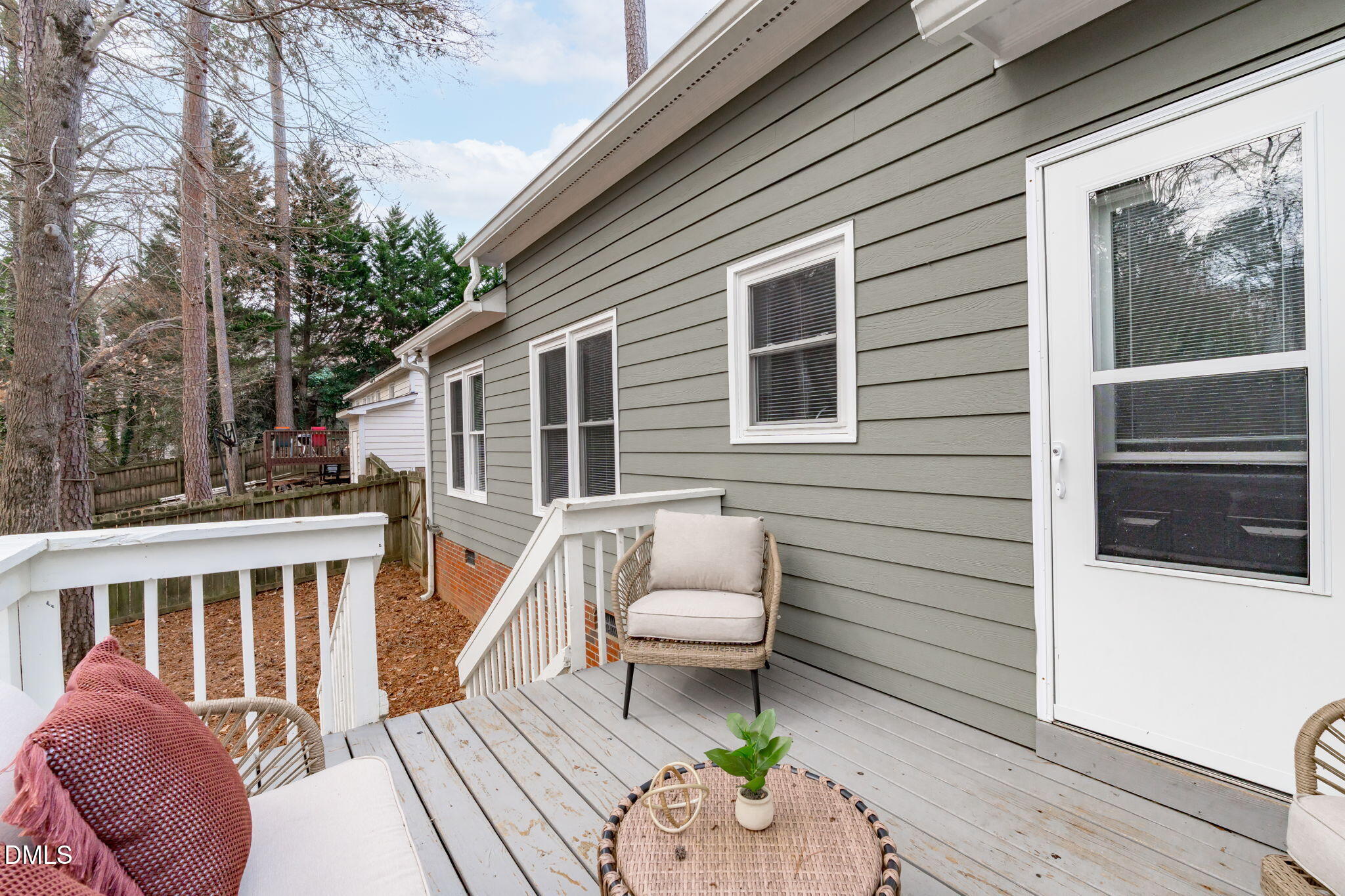 420 Johnson Street Garner, NC 27529 - Photo 33 of 43 a balcony with wooden floor and furniture