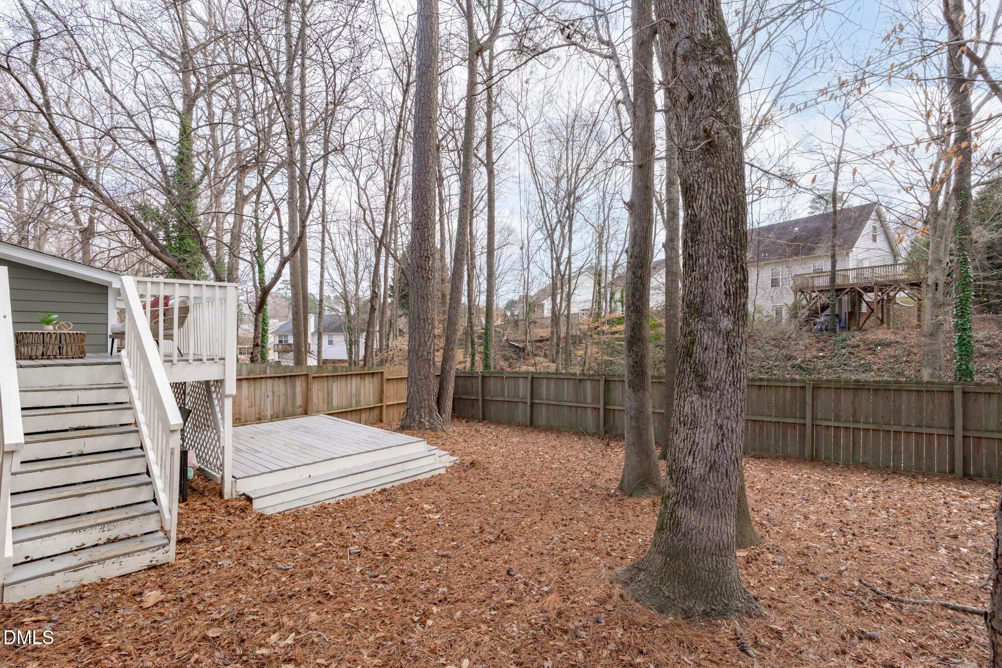 420 Johnson Street Garner, NC 27529 - Photo 36 of 43 a view of a yard with a trees