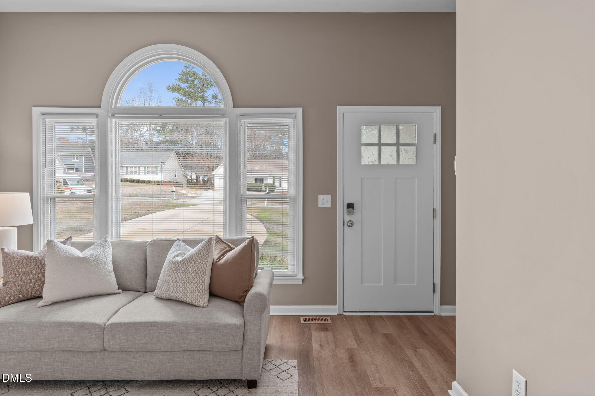 420 Johnson Street Garner, NC 27529 - Photo 4 of 43 a living room with furniture a large window and outer view