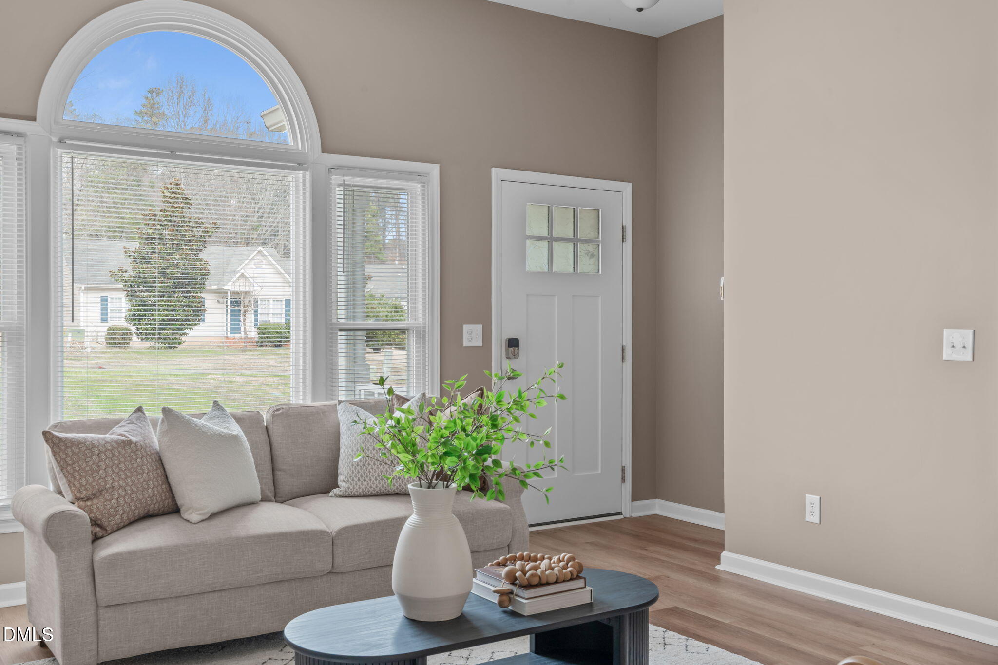 420 Johnson Street Garner, NC 27529 - Photo 5 of 43 a living room with furniture and a potted plant