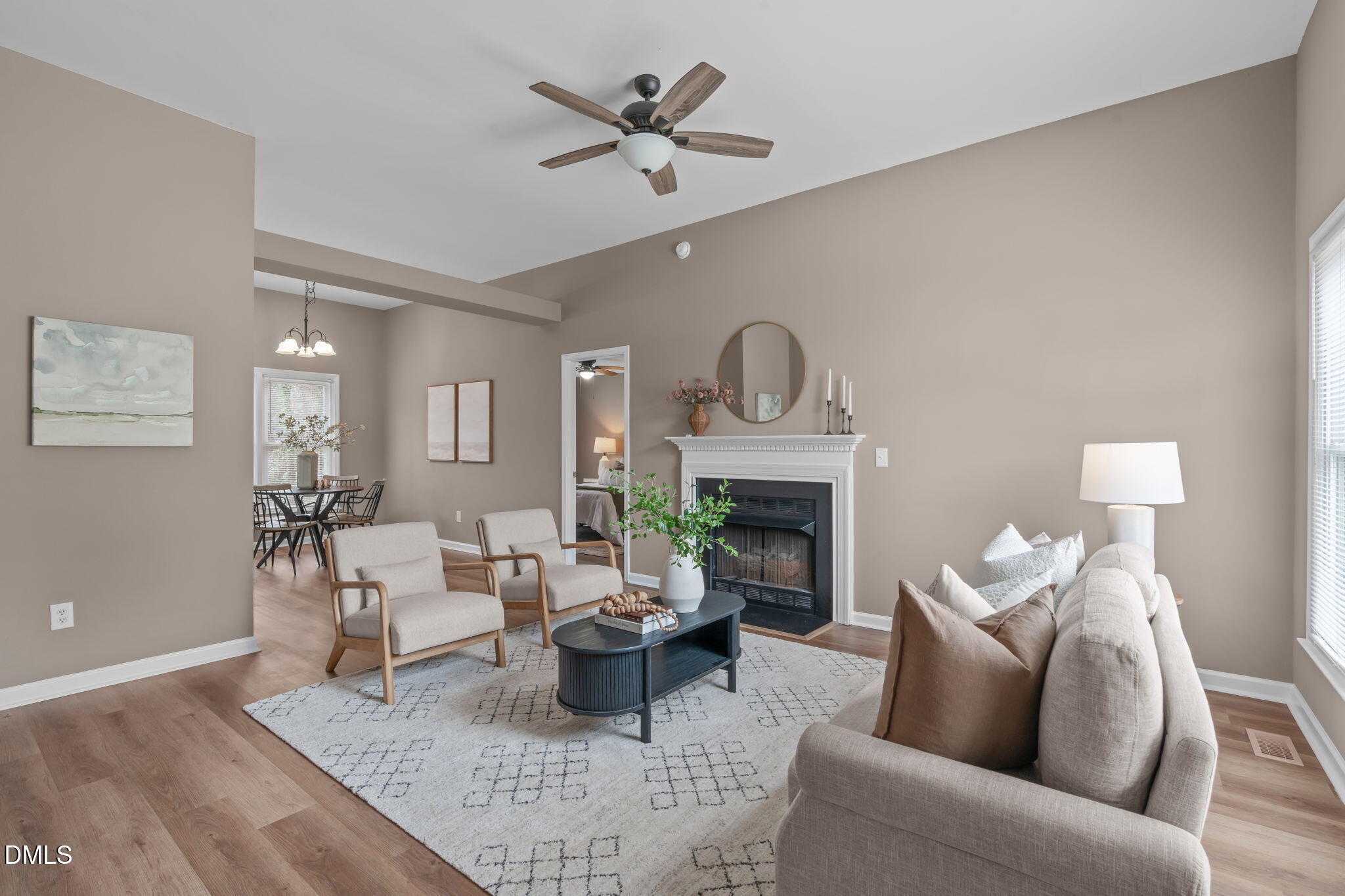 420 Johnson Street Garner, NC 27529 - Photo 6 of 43 a living room with furniture and a fireplace
