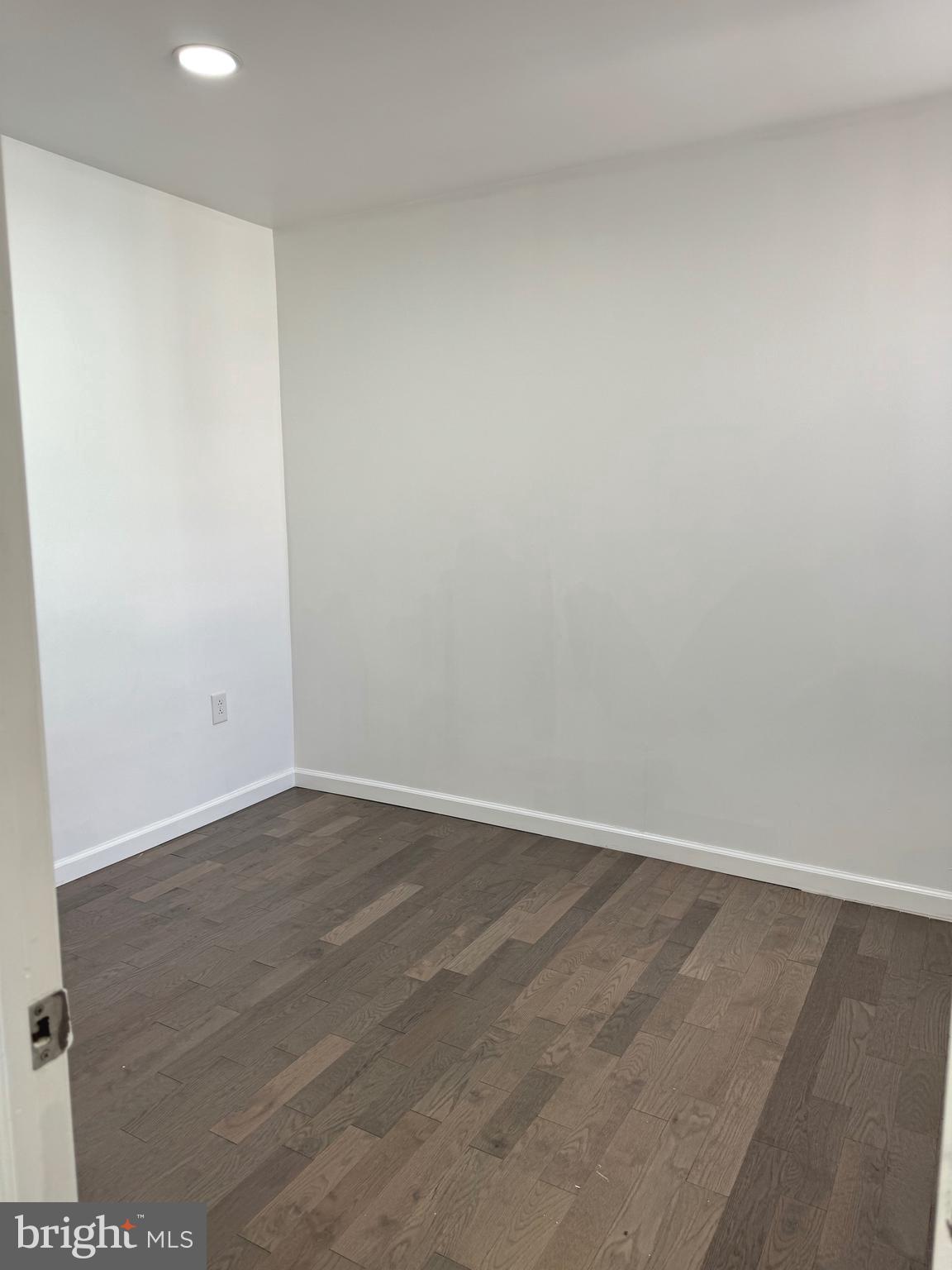 139 Rosemar Street Philadelphia, PA 19120 - Photo 14 of 19 an empty room with wooden floor