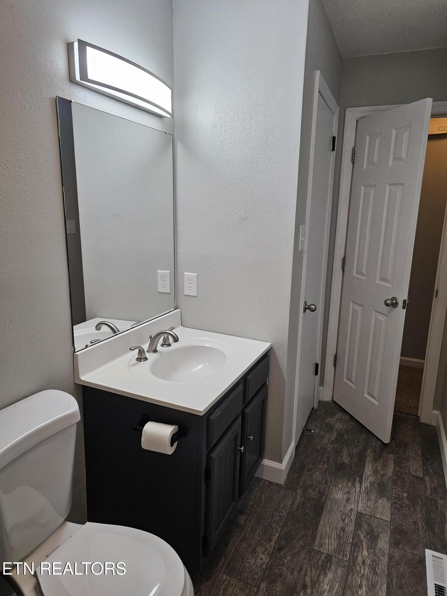 20 Clark Place Oak Ridge, TN 37830 - Photo 19 of 51 a bathroom with a sink toilet and mirror