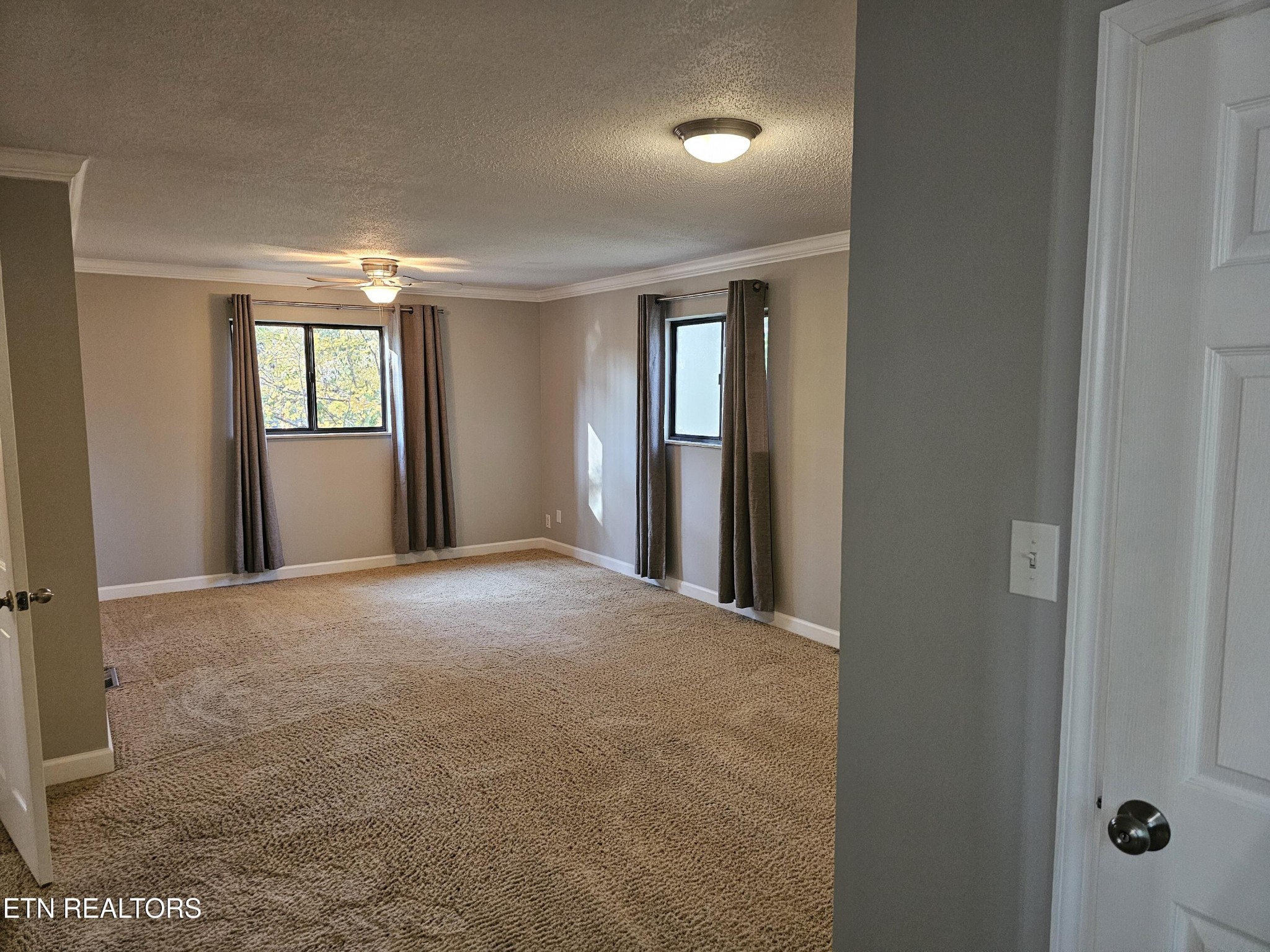 20 Clark Place Oak Ridge, TN 37830 - Photo 23 of 51 an empty room with windows and closet