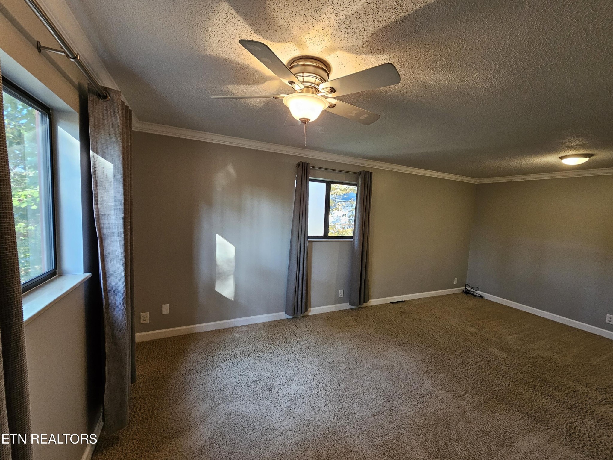20 Clark Place Oak Ridge, TN 37830 - Photo 24 of 51 a view of an empty room with a chandelier fan