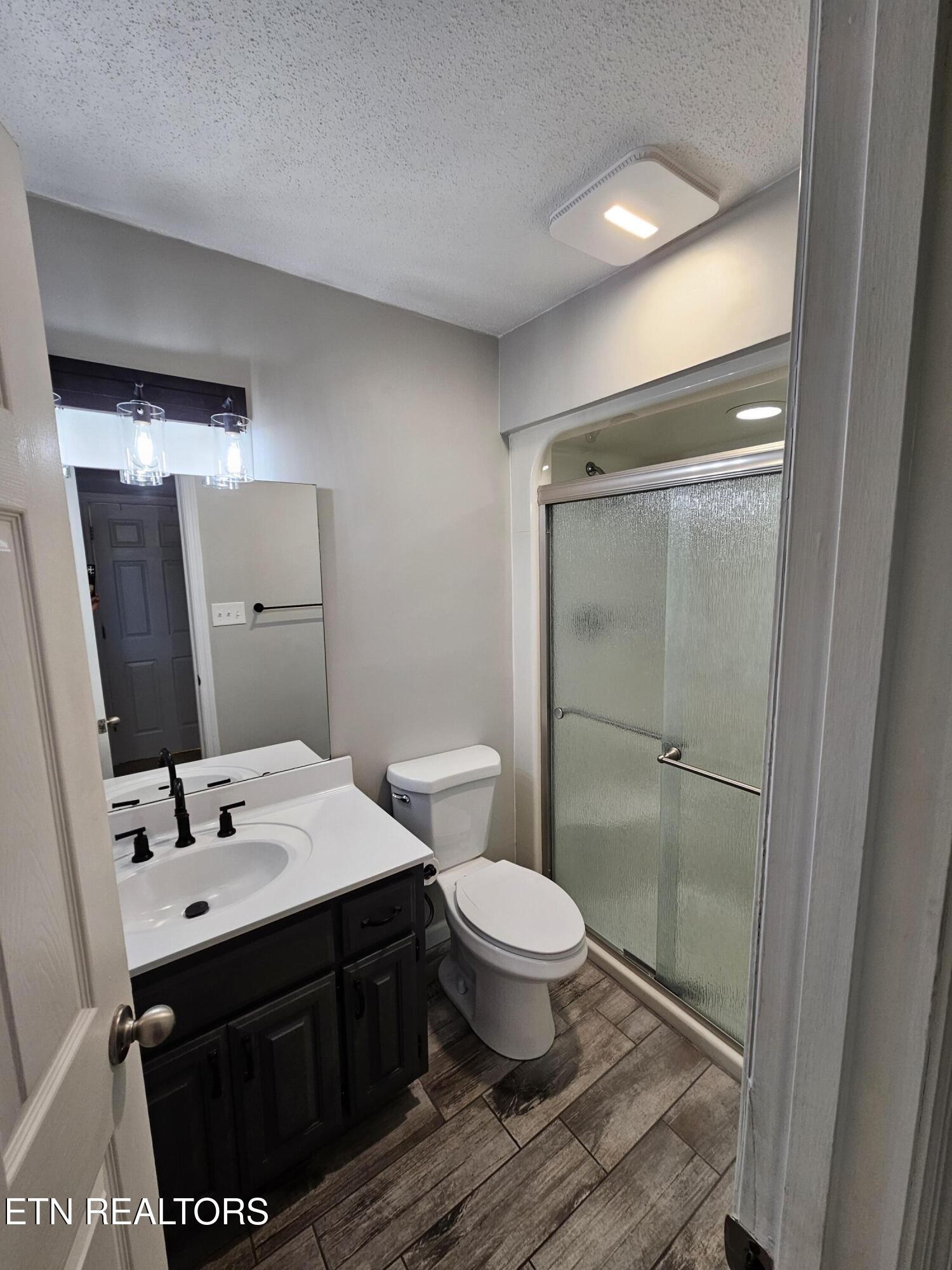 20 Clark Place Oak Ridge, TN 37830 - Photo 29 of 51 a bathroom with a sink and a mirror