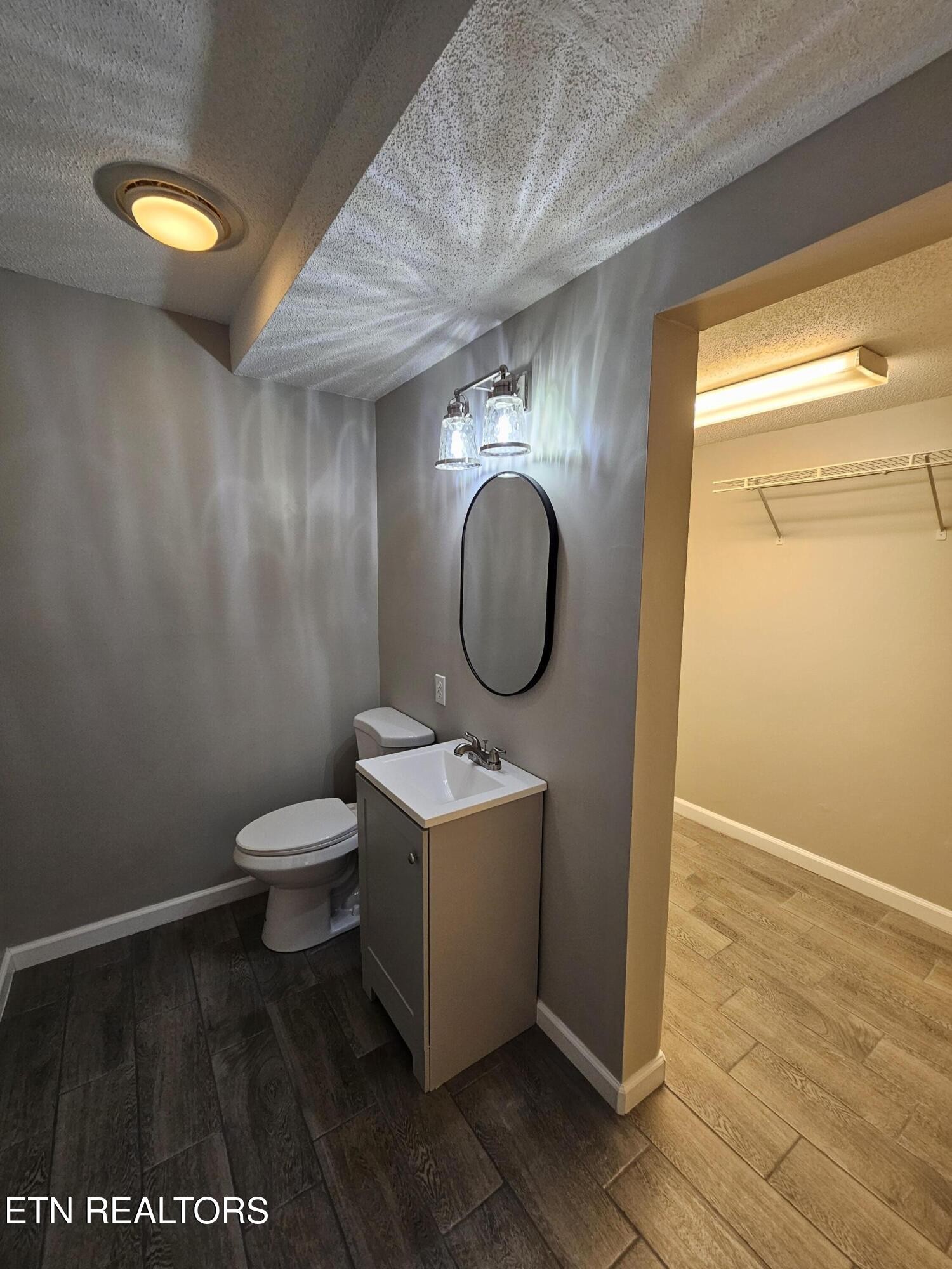 20 Clark Place Oak Ridge, TN 37830 - Photo 33 of 51 a room with a wooden floor and a sink