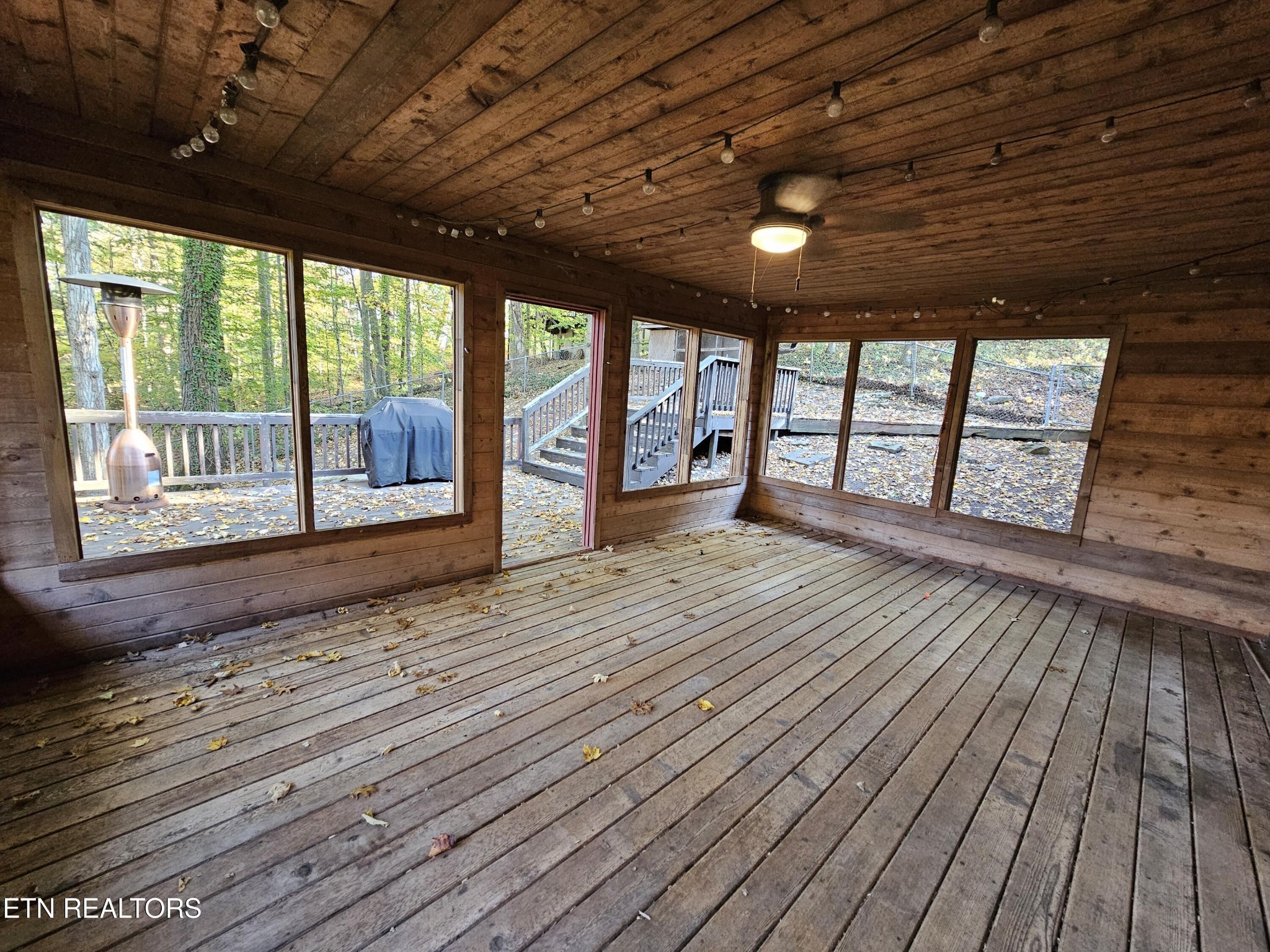 20 Clark Place Oak Ridge, TN 37830 - Photo 41 of 51 a view of an empty room with wooden floor and a window