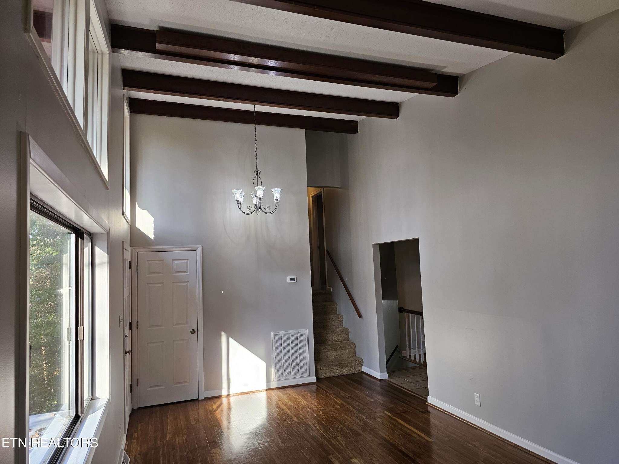 20 Clark Place Oak Ridge, TN 37830 - Photo 10 of 51 a view of a hallway with wooden floor and staircase