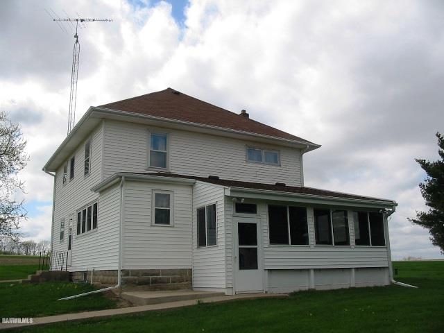 9815 West Raders Road Pearl City, IL 61062 - Photo 1 of 15 a view of a house with a yard