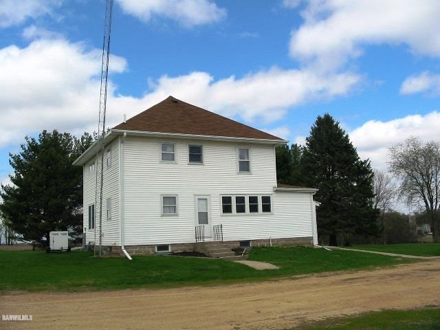 9815 West Raders Road Pearl City, IL 61062 - Photo 2 of 15 a view of a back yard of the house