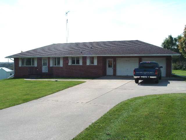 3623 W Route Freeport, IL 61032 - Photo 2 of 5 a house view with a garden space