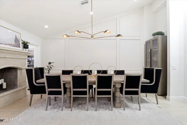 a view of a bedroom with a bed and glass door