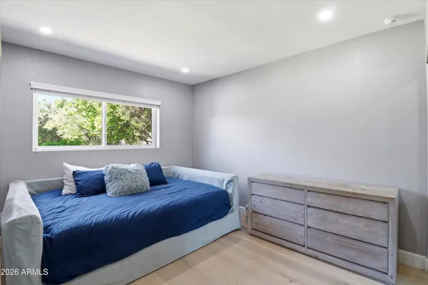 a bathroom with a sink double vanity and a mirror