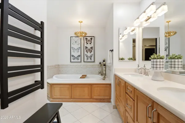 a bathroom with a sink and a window