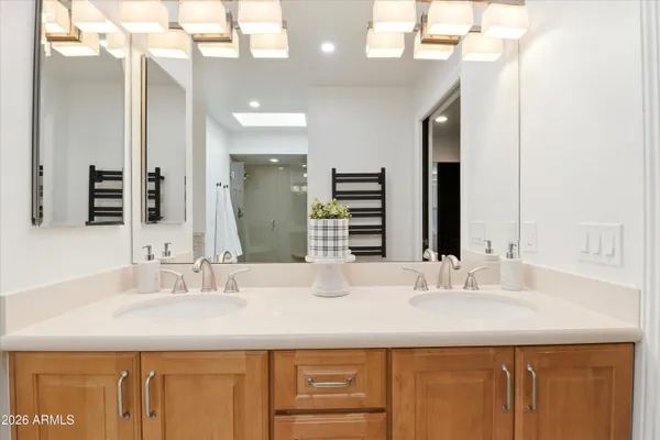 a bathroom with a toilet and a vanity