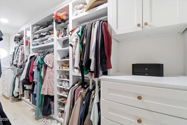 a dining room with furniture window and outside view