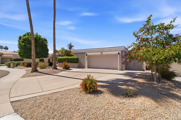 a view of a street with cars