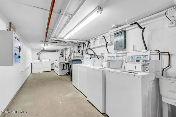 a utility room with cabinets
