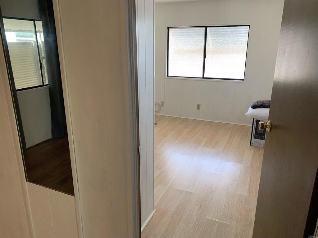 7 Lynn Lane Oceanside, CA 92058 - Photo 7 of 9 a view of a hallway