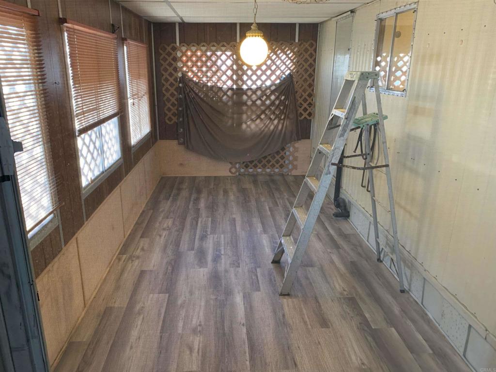 7 Lynn Lane Oceanside, CA 92058 - Photo 8 of 9 a view of entryway with wooden floor