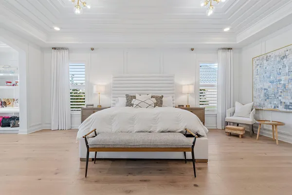 a view of a hallway with seating area