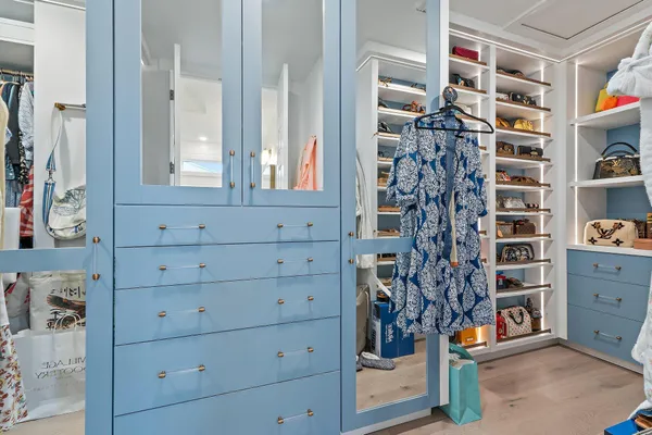 a bed room with a bed and a desk