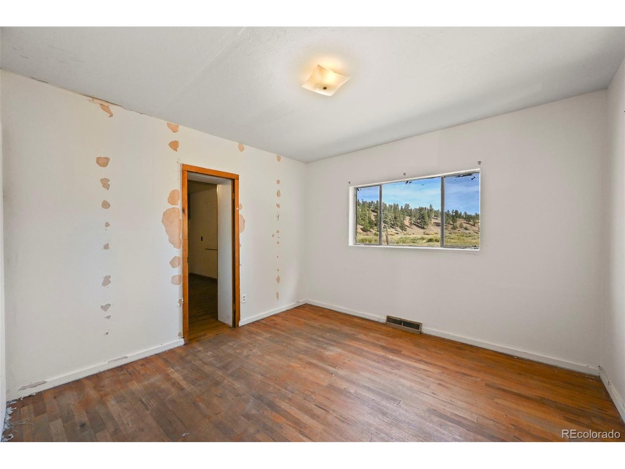 2677 South Platte River Road Sedalia, CO 80135 - Photo 16 of 42 a view of an empty room