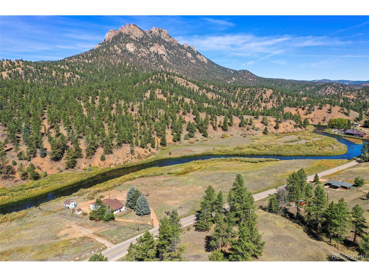 2677 South Platte River Road Sedalia, CO 80135 - Photo 3 of 42 a view of a city with an ocean view