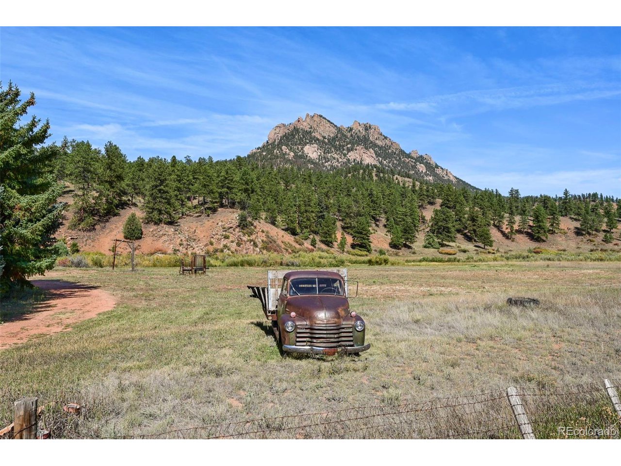 2677 South Platte River Road Sedalia, CO 80135 - Photo 5 of 42 a view of a yard with an ocean
