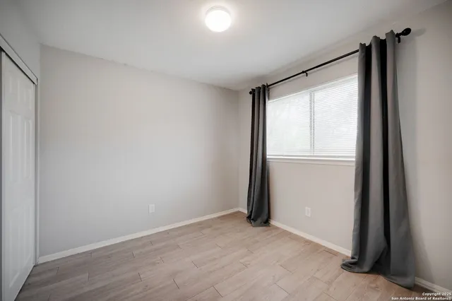 an empty room with windows