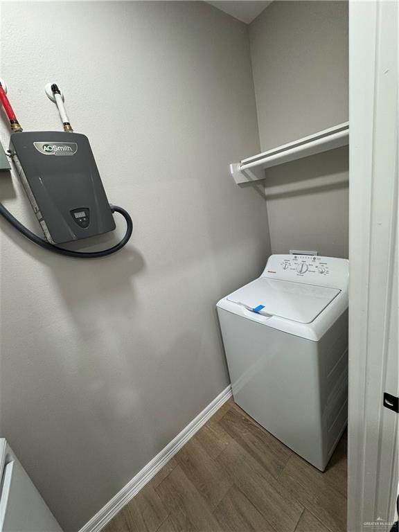 800 Ragland Road, Unit 9 Mission, TX 78572 - Photo 8 of 16 a utility room with dryer and washer