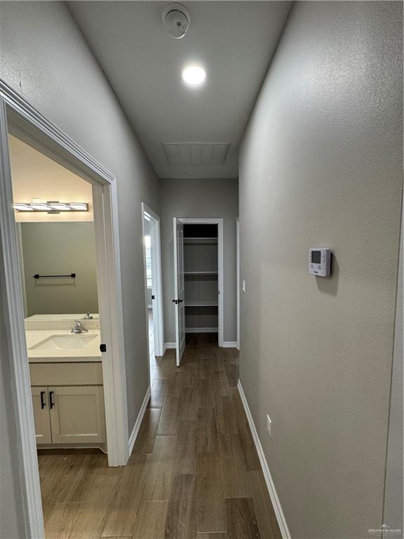 800 Ragland Road, Unit 9 Mission, TX 78572 - Photo 10 of 16 a view of a hallway to a livingroom with furniture