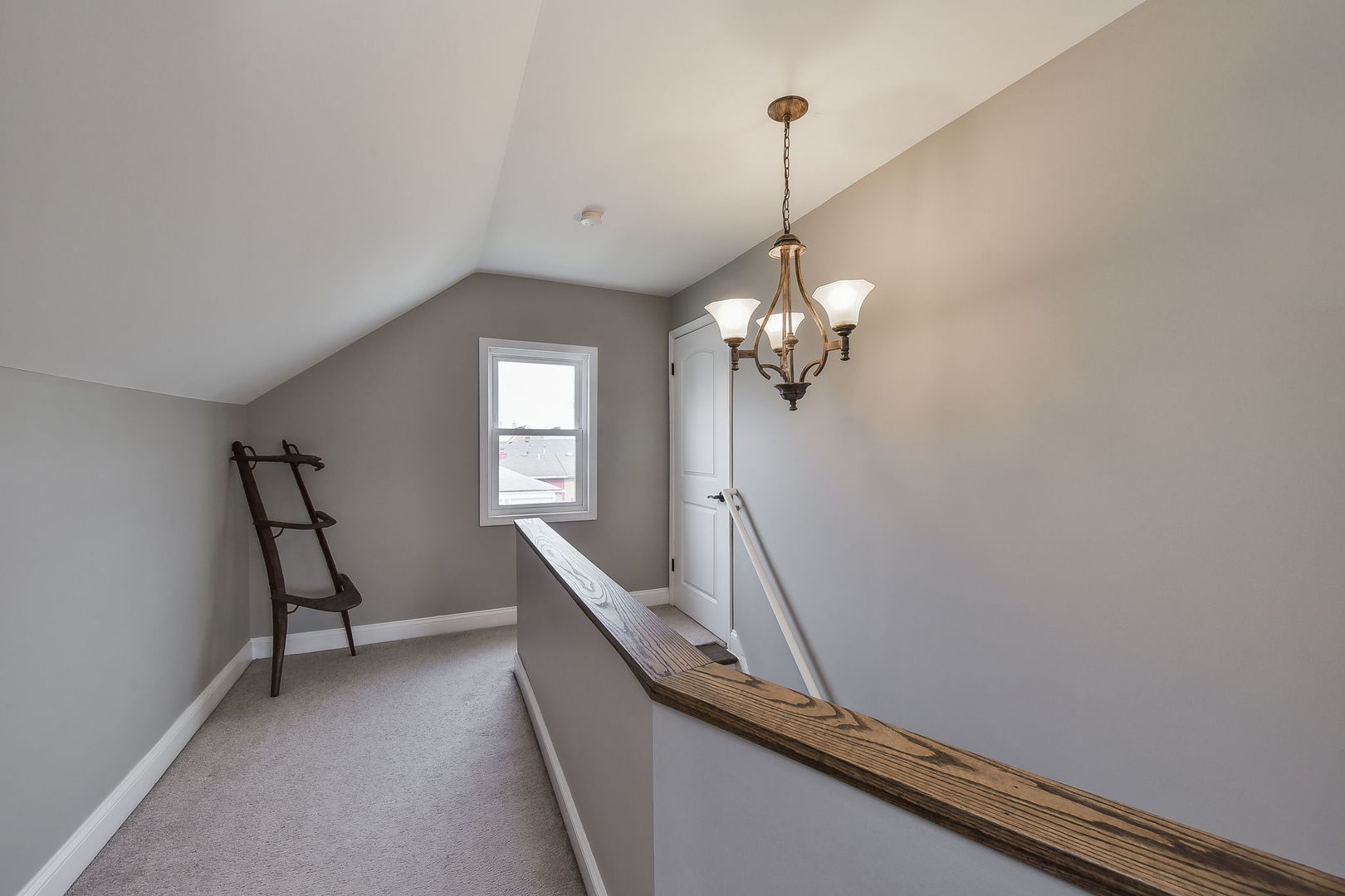 1500 Lee Boulevard Berkeley, IL 60163 - Photo 11 of 22 a view of a hallway with a chandelier