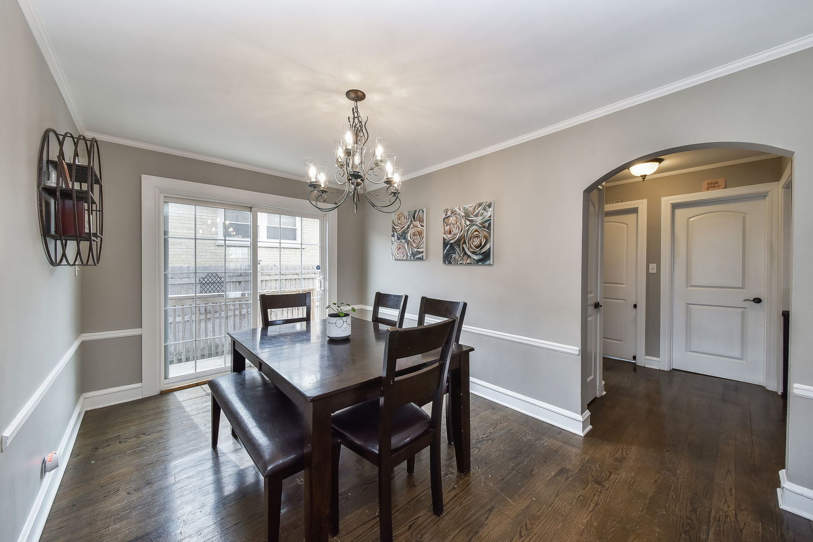 1500 Lee Boulevard Berkeley, IL 60163 - Photo 5 of 22 a view of a dining room with furniture wooden floor and chandelier