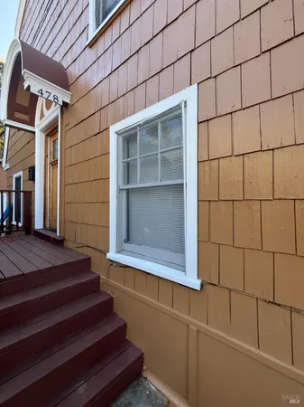 a view of entryway with a door