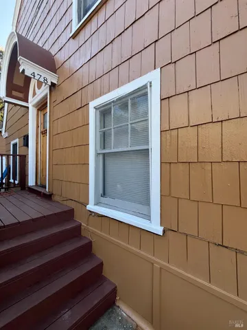a view of entryway with a door